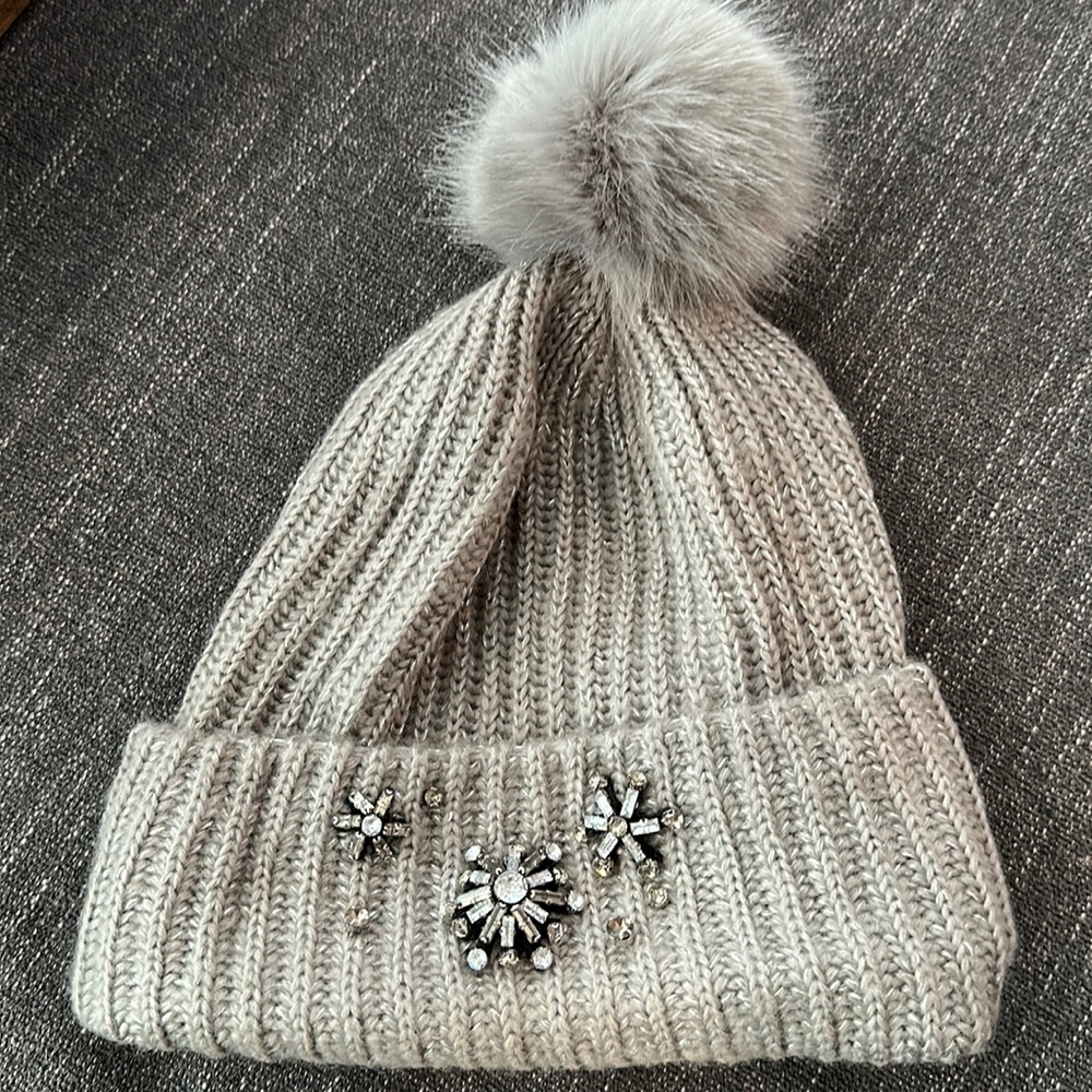 Victoria’s Secret beanies.  2 of them